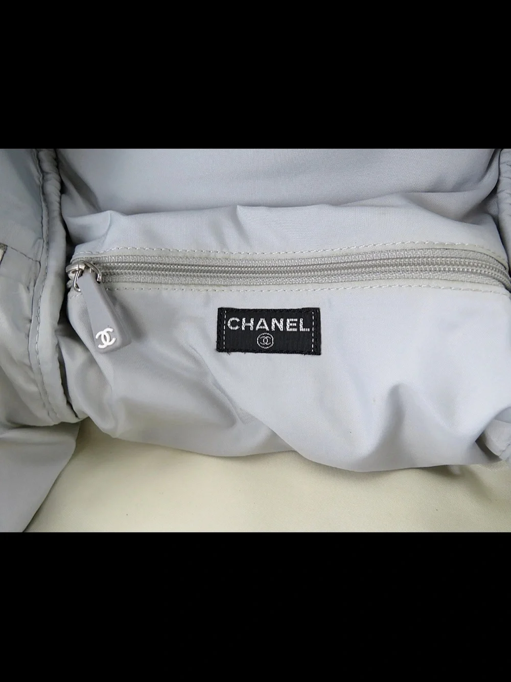 CHANEL Cream and Taupe Men's Canvas Backpack with Black Straps